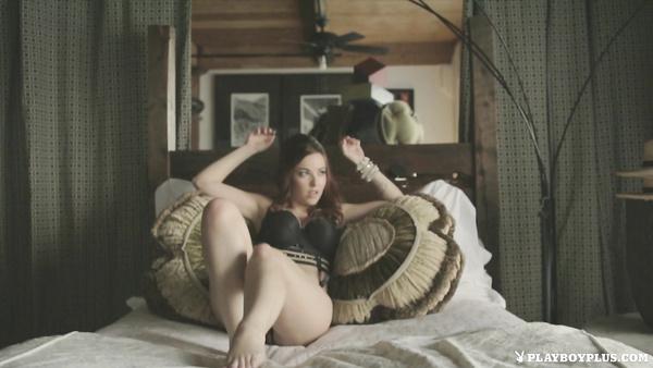 Charming red-haired porn model with a beautiful body