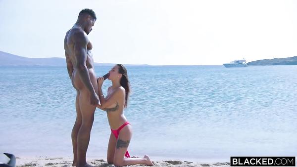 Black diver and his adorable young girlfriend having sex on the beach